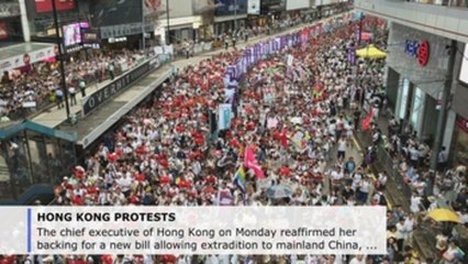 HK chief to go forward with extradition bill amid protests but offers tweaks