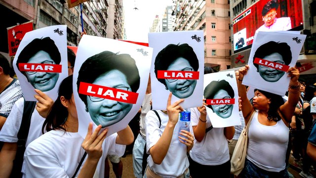 Hong Kong to push ahead with extradition law despite protests