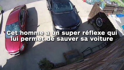 Cet homme a un super réflexe qui lui permet de sauver sa voiture  !