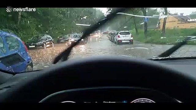 'It sounded like bullets were hitting my car!' Severe hail leaves windscreens cracked and drivers stranded in Munich