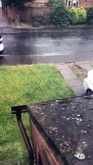Irate Woman Shatters Window