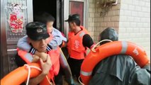 Woman trapped in flooded house cries out after firefighters finally arrive to rescue her