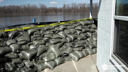 Why do people use sandbags before a flood?