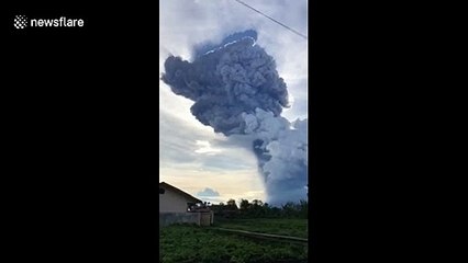 Massive ash cloud billows into air in North Sumatra following volcano's eruption
