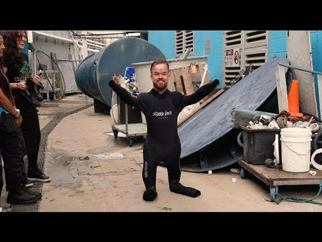 Brad Williams in a shark tank