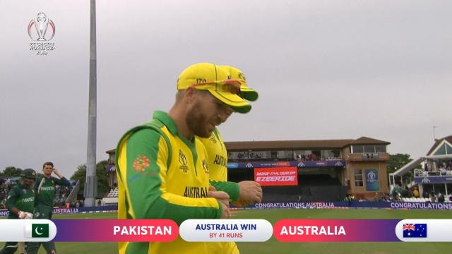 Warner century helps Australia edge past Pakistan