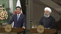 Shinzo Abe a Rouhani: 