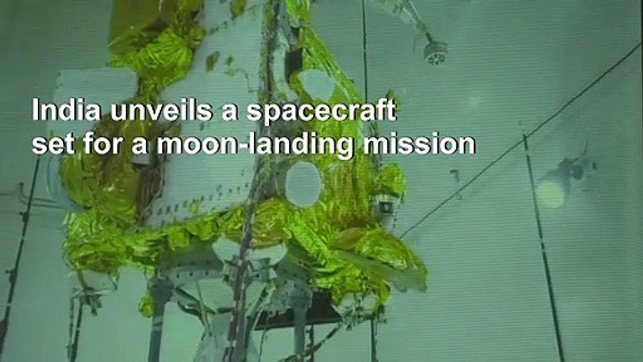 India unveils spacecraft for moon-landing mission