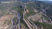 Spectacular drone footage of 3-storey highway built along China's Tianlong Mountain