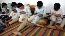 Surmonter les traumatismes en Afghanistan: Une famille d'amputés
