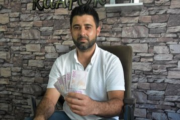 ATM'de unutulan paranın sahibini arıyor
