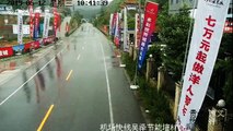 Massive landslide in China blocks highway seconds after motorcyclist drives past