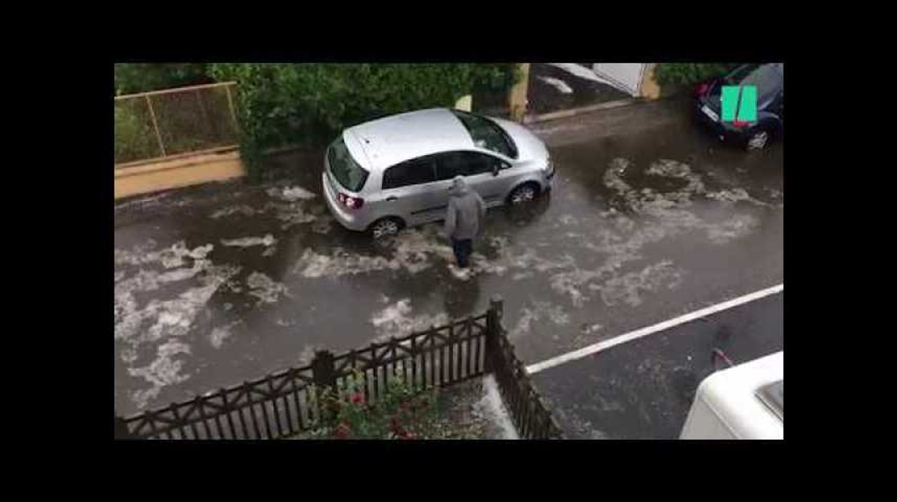 Pluies de grêles, rues inondées: les images de l'orage qui a traversé la région Auvergne-Rhône-Alpes
