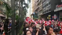 Thousands in black choke Hong Kong's city centre in rally to demand Carrie Law's resignation