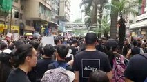 Thousands in black choke Hong Kong's city centre in rally to demand Carrie Law's resignation