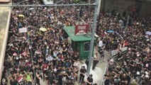 Cientos de miles de hongkoneses se manifiestan para pedir retirada ley
