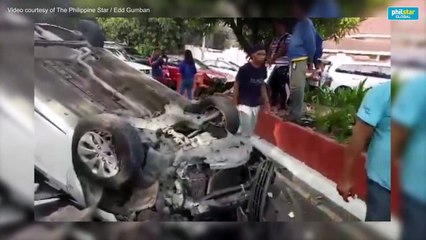 Sleeping driver’s vehicle flips over after hitting island in Manila