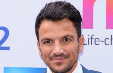 Peter Andre racially abused a school