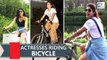 Bollywood Divas Riding Bicycle On Road