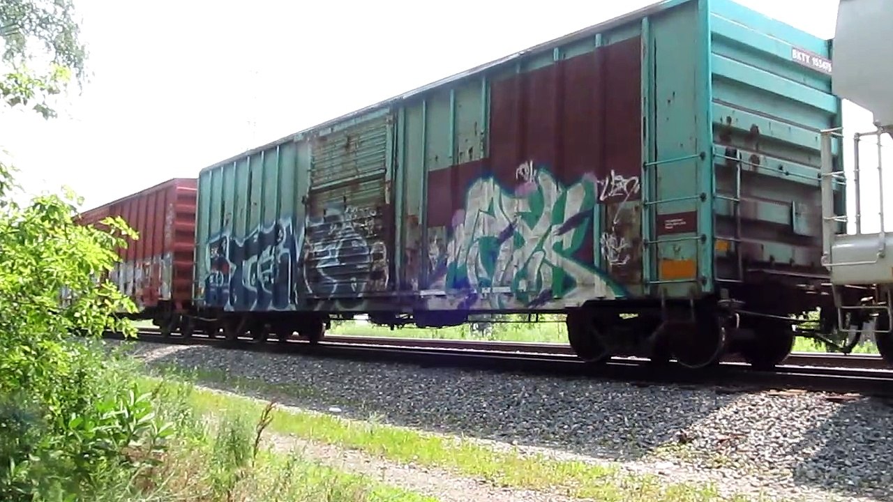 CSX Train stops and slowly moves again at Hemlock Park Dearborn Michigan