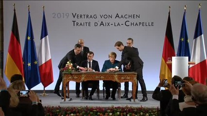 Reunión Merkel-Macron en Davos