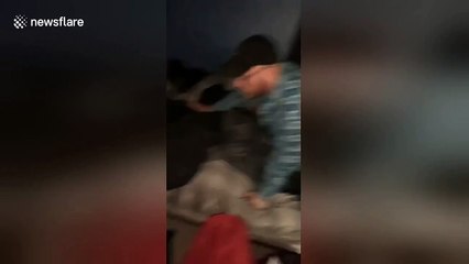 Drunk man dances lying in bed thinking he’s still at the club