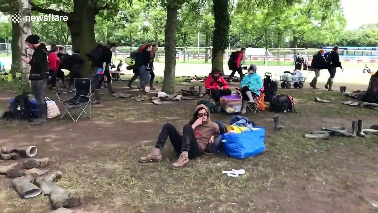 Thousands of wellies left abandoned in fields following Download Festival in England