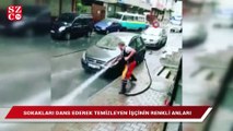 Sokakları dans ederek temizleyen işçinin renkli anları kamerada