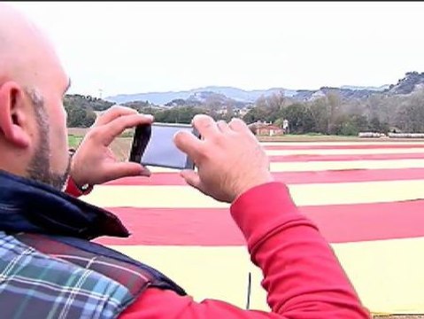 Los partidarios del sí, sí ultiman los preparativos a un día de la votación del 9-N.