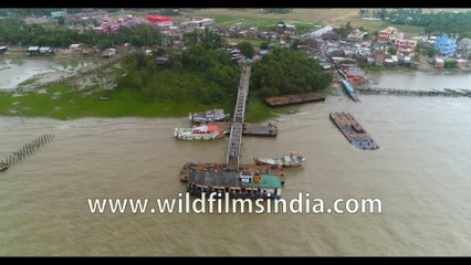 4K birds eye view of the coastline , Kakdwip island, Hooghly river meeting the Bay of Bengal at Gangasagar, West Bengal, India. Stock footage.