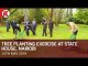 Uhuru Kenyatta lead State House staff in tree planting at State House, Nairobi