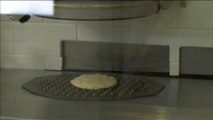 Un robot que hace pizza, lo último en cocina