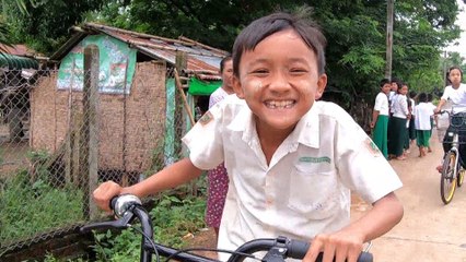 Myanmar children getting to school on recycled bike-sharing stock from Singapore and Malaysia