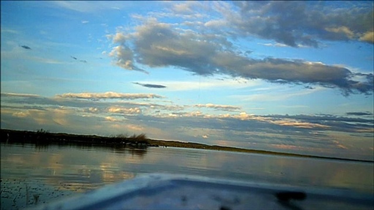 MCH 108 CAUGHT A FISH WELL  ENJOYING THE VIEW WELL FISHING AT GULL LAKE ALBERTA CANADA.GPS 52º27'54.75" N 113º55'55.76" W