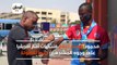 محمود يرسم أعلام منتخبات أمم أفريقيا على وجوه المشجعين: دعما للبطولة
