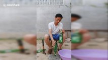 Talented Chinese man shows off incredible bottle balancing skills