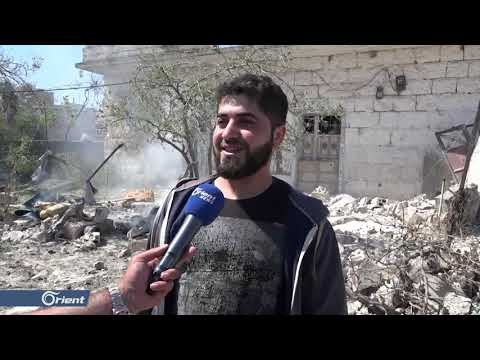 جرحى مدنيون بقصف براميل متفجرة على بلدة حزارين جنوب إدلب - سوريا