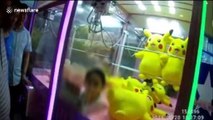 Chinese girl gets stuck in claw machine after trying to get her hands on Pikachu toy