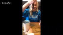 A woman attempts the boba challenge creating a mess
