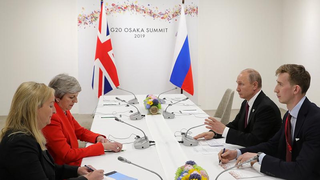 British PM May confronts Putin over Skripal poisoning in tense G20 meeting