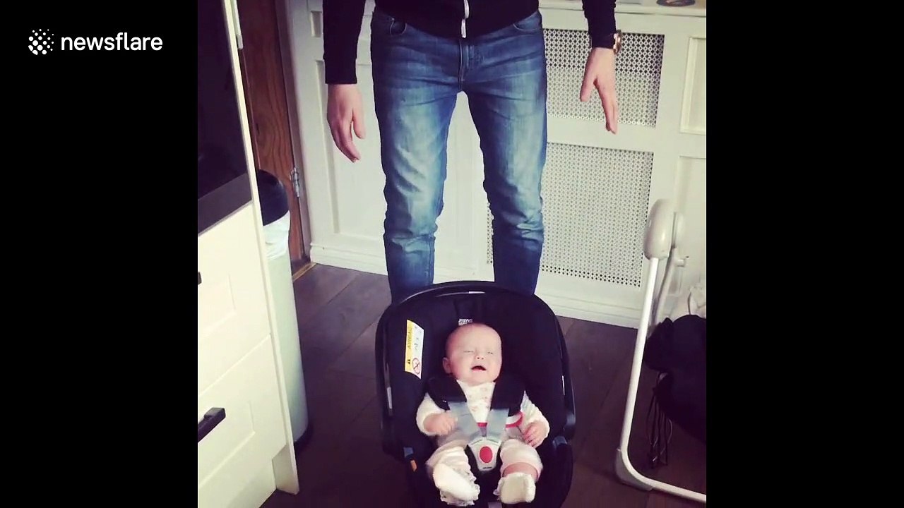 Clever UK father stops baby from crying by pretending car seat is a robot