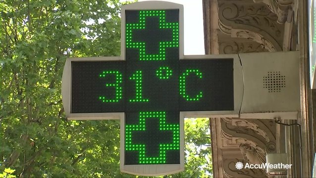 Residents and tourists alike try to cool off as Paris heats up