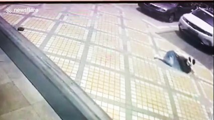 Weight plate falling from residential building hits woman in Shenzhen, China