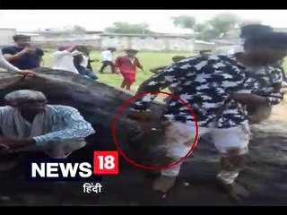 पंचायत में पिस्तौल दिखाकर दबंगई दिखाना पड़ी भारी, लोगों ने जमकर पीटा-Young men shown pistol in panchayat then people beaten him in alwar