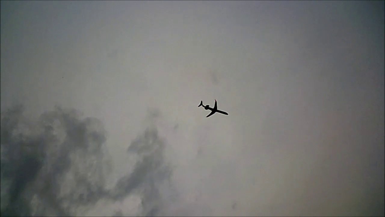 MCH 113 COMERCIAL JET OVER HATCHERY BOW RIVER CALGARY ALBERTA CANADA.