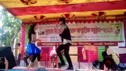 Boys and girls dance in a colorful program