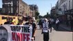 Demonstrators protesting knife crime in London join victim's funeral procession