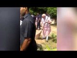 Prime Minister Narendra Modi sweeps the premises of school in Delhi