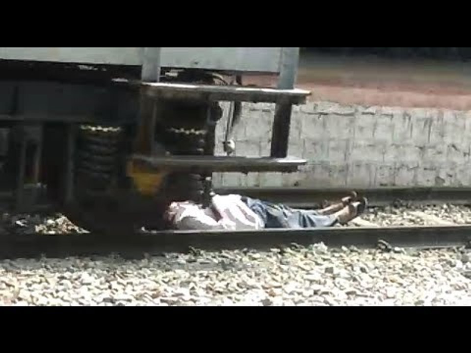Andhra man lies on tracks as goods train passes over him