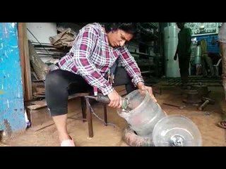 Sangeetha makes a sink and container out of an empty water can